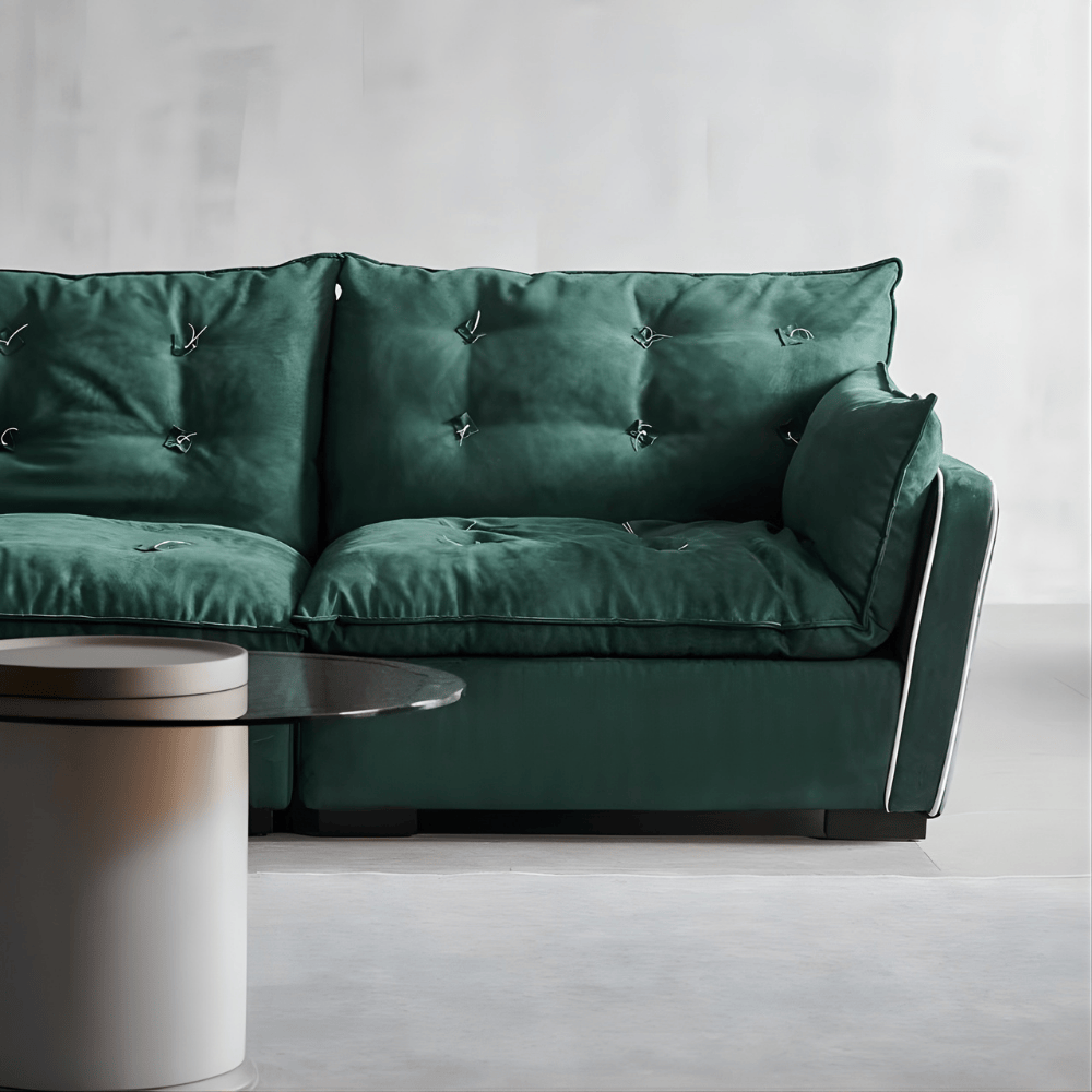 Front view of the Modern Green Velvet Sofa showing tufted cushions and soft velvet texture in a minimalist interior. Front view of the Modern Green Velvet Sofa showing tufted cushions and soft velvet texture in a minimalist interior.